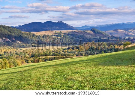 The Pieniny Mountains landscape, Carpathians. Daylight scenery with trees, meadows and moutains.