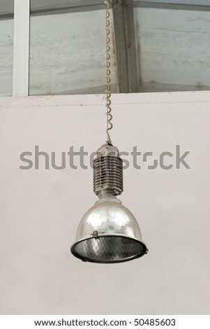 a lamp inside an old factory