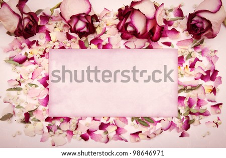 Gift card on dried rose petals