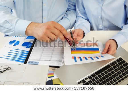 Businessmans working with documents in the office