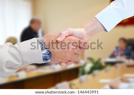 Business handshake. Businessmans working in the office