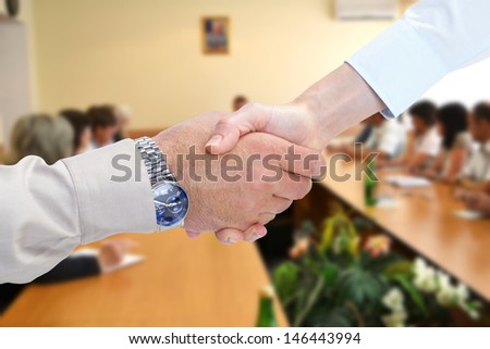 Business handshake. Businessmans working in the office
