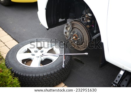 Tire changing in the professional car repair service