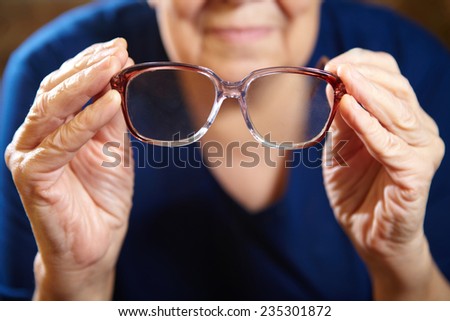 Old woman with eyeglasses. Senior people health care.