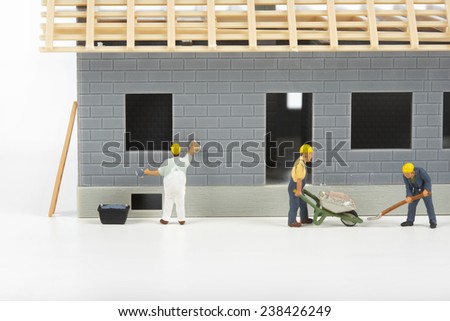 Construction of cottages. Isolated on the white background