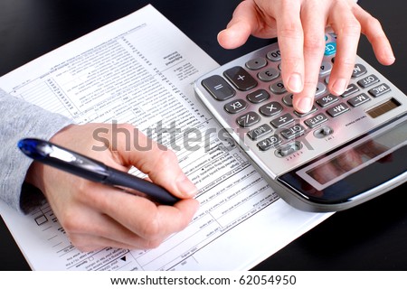 Accountant filling the forms out.