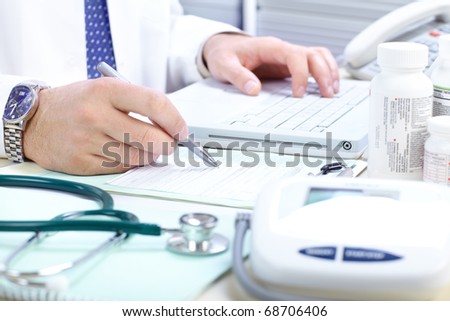 Medical doctor working in the office
