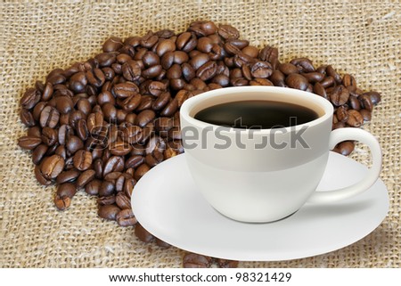 It is a lot of coffee grains lay on a fabric
