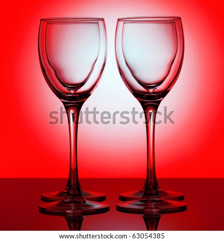 Four glass for a wine behind each other over circle white background