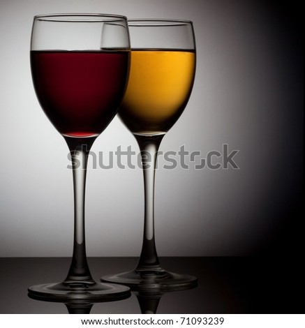 Two wine glass over circle background