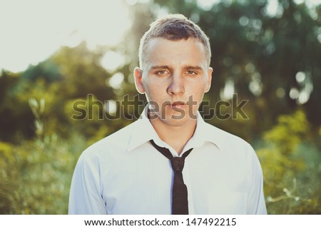 Cute guy in a tie and white shirt