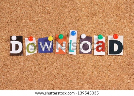 The word Download in cut out magazine letters pinned to a cork notice board