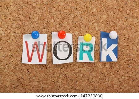 The word Work in cut out magazine letters on a cork notice board. Work is the foundation of a successful business, your career and the way to rewards for employment.