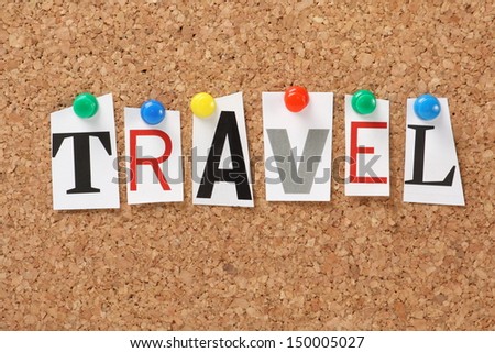 The word Travel in cut out magazine letters pinned to a cork notice board. Travel may be used to describe transport, leisure activities or the commute to work and is always part of the daily news.