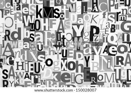 A black and white image of cut out magazine letters pasted to a board in a random collage.