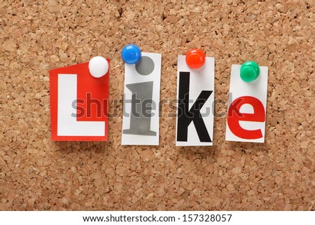 The word Like in cut out magazine letters pinned to a cork notice board. Collecting Likes is an important part of social media marketing and driving business to your web site