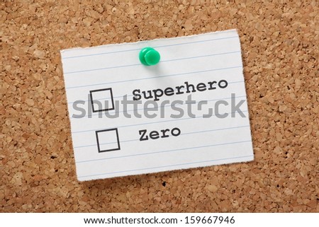 Superhero or Zero? tick boxes on a paper note pinned to a cork notice board.