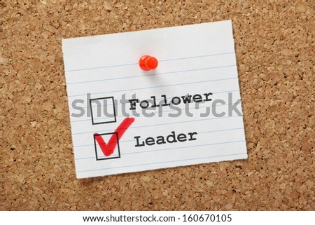 Are you a Follower or a Leader tick boxes on a paper note pinned to a cork notice board