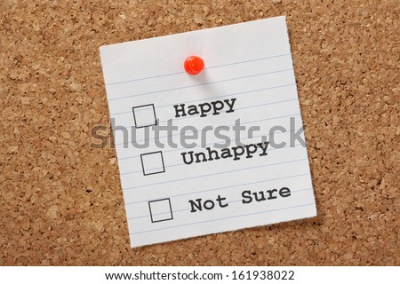 Happy, Unhappy or Not Sure tick boxes on a paper note pinned to a cork notice board. A survey or questionnaire we subject ourselves to every day for most people.