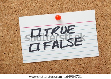 True or False tick boxes on a white note card pinned to a cork notice board
