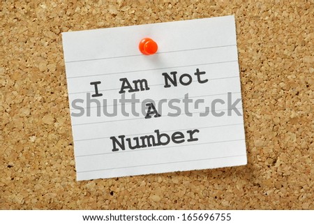 The Phrase I Am Not A Number Typed Onto A Piece Of Paper And Pinned To A Cork Notice Board. A Concept For Being Treated With Respect As An Individual Person.
