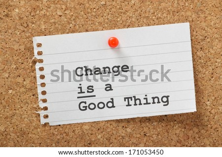 The phrase Change is a Good Thing typed on a piece of lined paper and pinned to a cork notice board