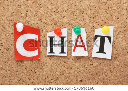 The word Chat in cut out magazine letters pinned to a cork notice board