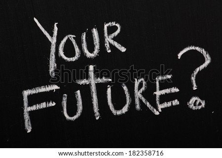 The phrase Your Future with a question mark written in white chalk on a blackboard