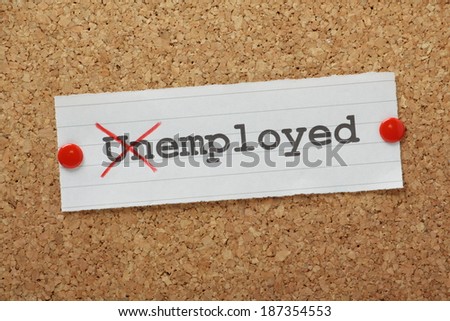 The word Unemployed changed to read Employed on a paper note pinned to a cork notice board