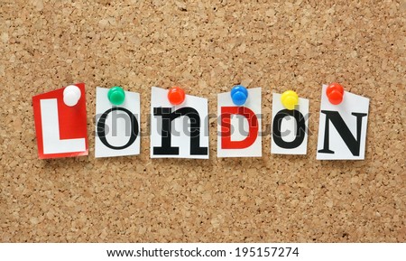 The name London in cut out magazine letters pinned to a cork notice board