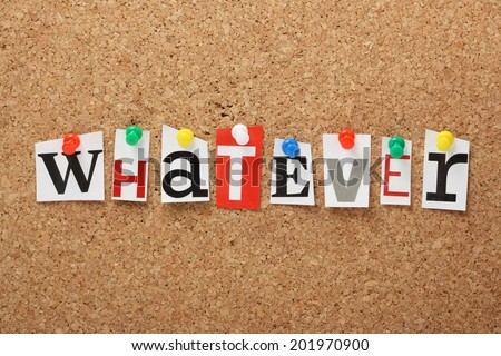 The word Whatever in cut out magazine letters pinned to a cork notice board