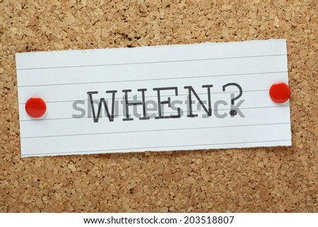 The question When? typed on a piece of note paper and pinned to a cork notice board