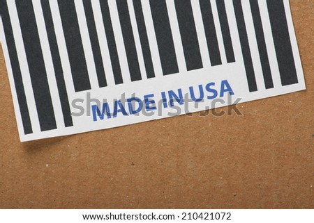 Bar code label on a cardboard box with the words Made in USA