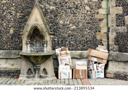 Reading, England - Aug 28th, 2014: Boxes outside St Laurence church ready for the  Collection Service provided by the Reading Business Improvement District or BID. There are now 160 BIDs in the UK