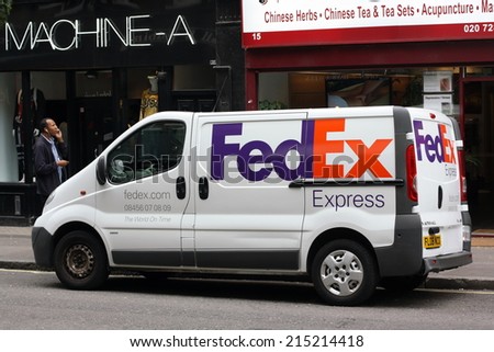 London, England - Sept 4th, 2014: A FedEx Express van parked in front of retail and other businesses in the Soho District of London. The Express division delivers to more than 220 countries.