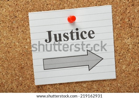 The word Justice above an arrow pointing in the right direction on a lined paper note pinned to a cork notice board
