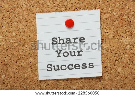 The phrase Share Your Success typed on a paper note and pinned to a cork notice board