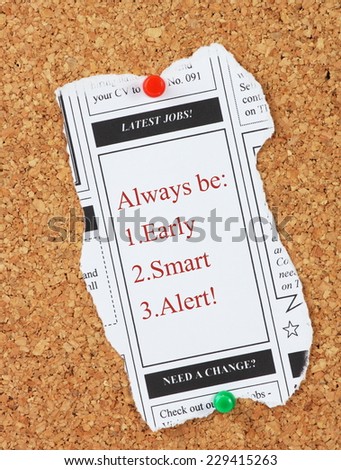 Latest jobs newspaper clipping pinned to a notice board with advice for job interviewees to be Early,Smart and Alert
