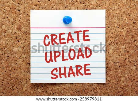 The phrase Create, Upload and Share written on a lined index card and pinned to a cork notice board