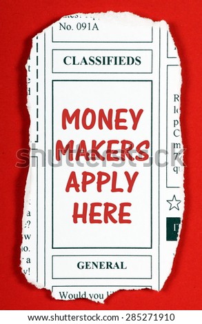 The phrase Money Makers Apply Here in red text on a newspaper clipping from the classified advertising section