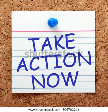 The phrase Take Action Now in blue text on a paper card pinned to a cork notice board as an incentive or reminder