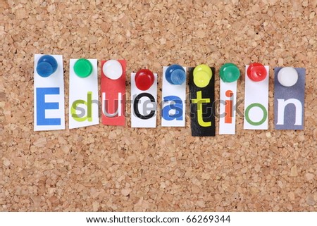 The word Education in cut out magazine letters pinned to a cork notice board