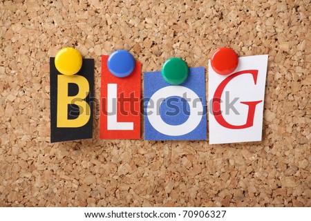 The word BLOG in cut out magazine letters pinned to a cork notice board