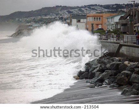 Huge wave crashes over the seawall in Pacifica, CA
