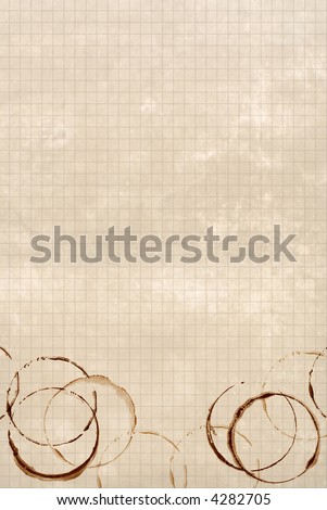 Coffee stains on textured grid paper