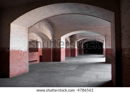 A series of brick arches in an old fort.