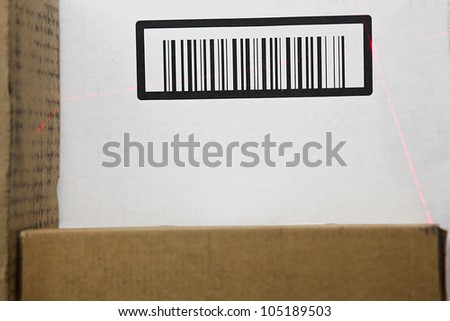 Brown and white barcode scan by a thin laser.