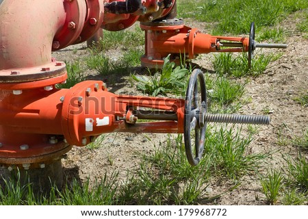 Outdoor water system supply pipe and valves.