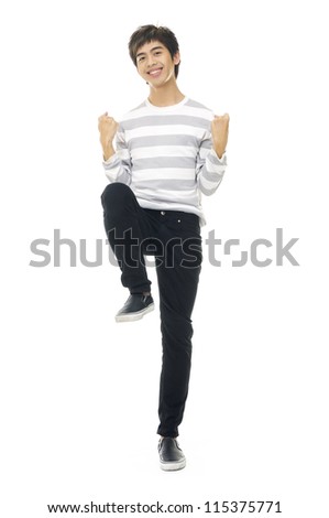 Full body Happy young man celebrating success