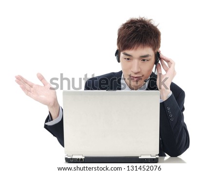 Businessman with headphones and laptop on help center